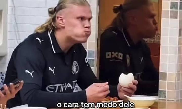É #FAKE vídeo de Haaland tomando susto ao se ver de boca cheia em espelho de restaurante; cena foi manipulada com IA